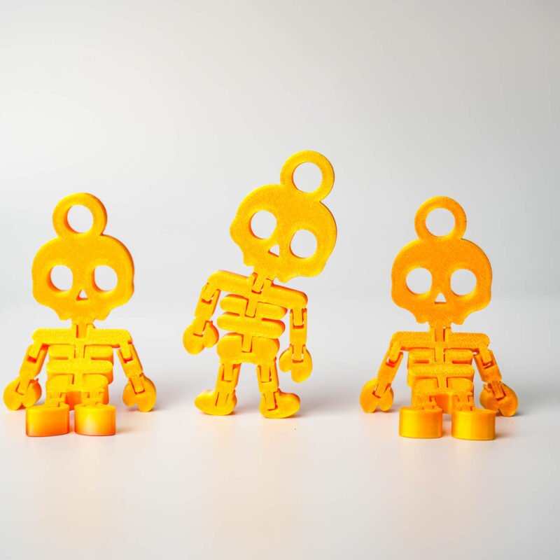 Ruchomy Szkieletor 3D – brelok z charakterem! Kolor Fire Red