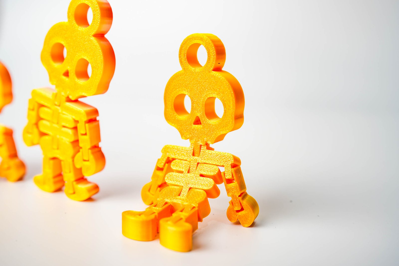 Ruchomy Szkieletor 3D – brelok z charakterem! Kolor Fire Red - obrazek 4