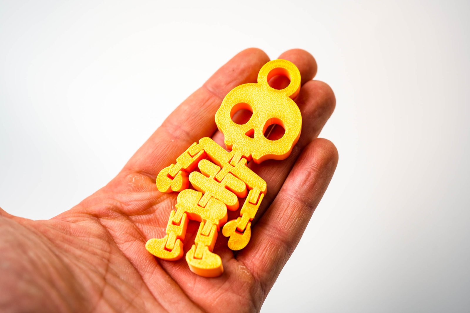 Ruchomy Szkieletor 3D – brelok z charakterem! Kolor Fire Red - obrazek 6